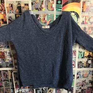 basic blue sweater with cut on the sides detail
